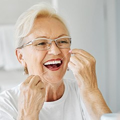 Maintaining your oral hygiene is essential for dental implant success