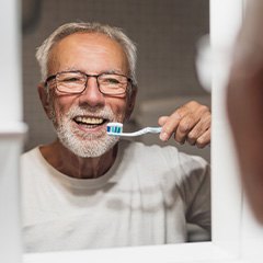 A man brushing his teeth
