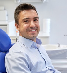 Man smiling in dental chair