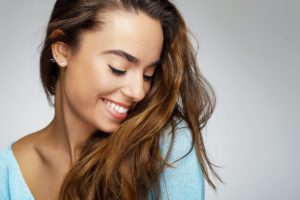 woman smiling, cosmetic bonding, young woman, happy woman 