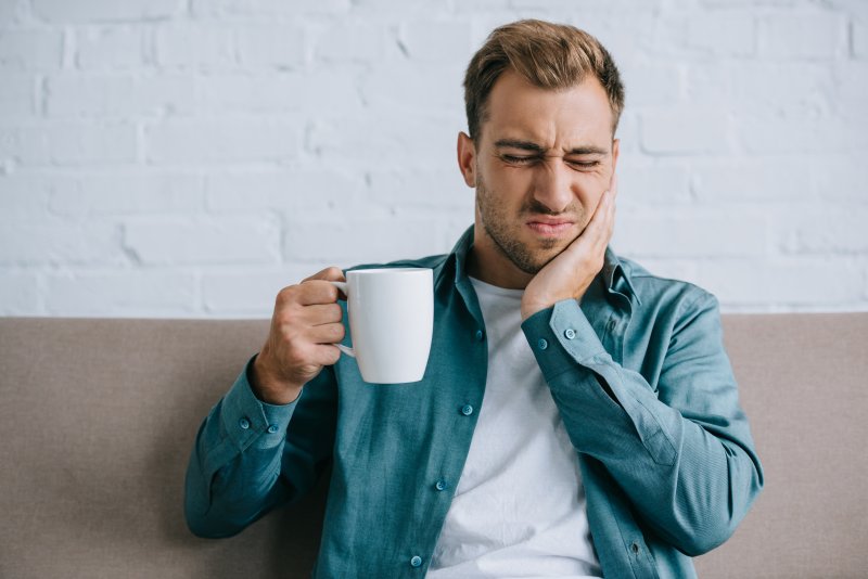 Man experiencing a toothache 