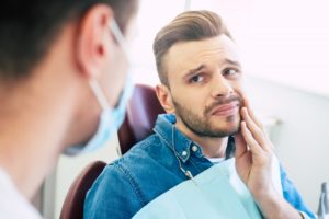 Man with toothache visiting emergency dentist in Ponte Vedra Beach